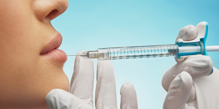 A close-up of a person getting an injectionAI-generated content may be incorrect.